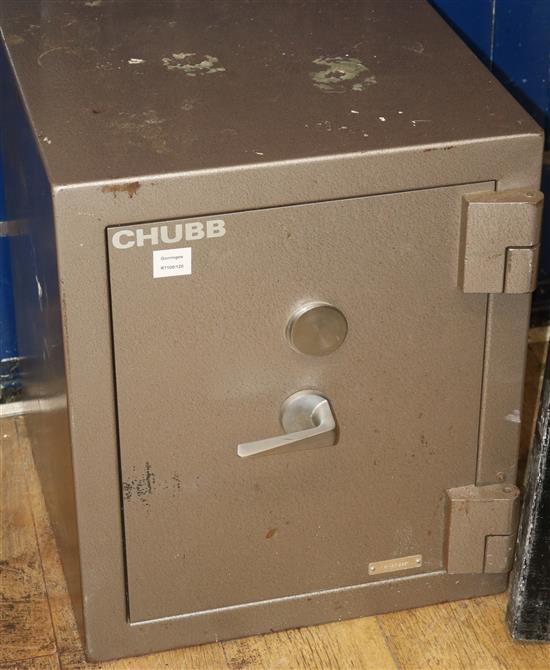 A modern metal safe with keys